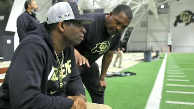 Deion Sanders watches practice at the University of Colorado